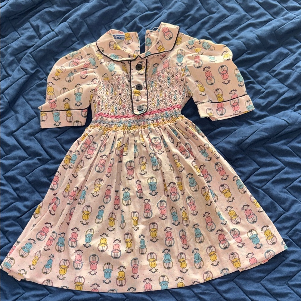Gorgeous vintage Smocked Dress with Doll Print